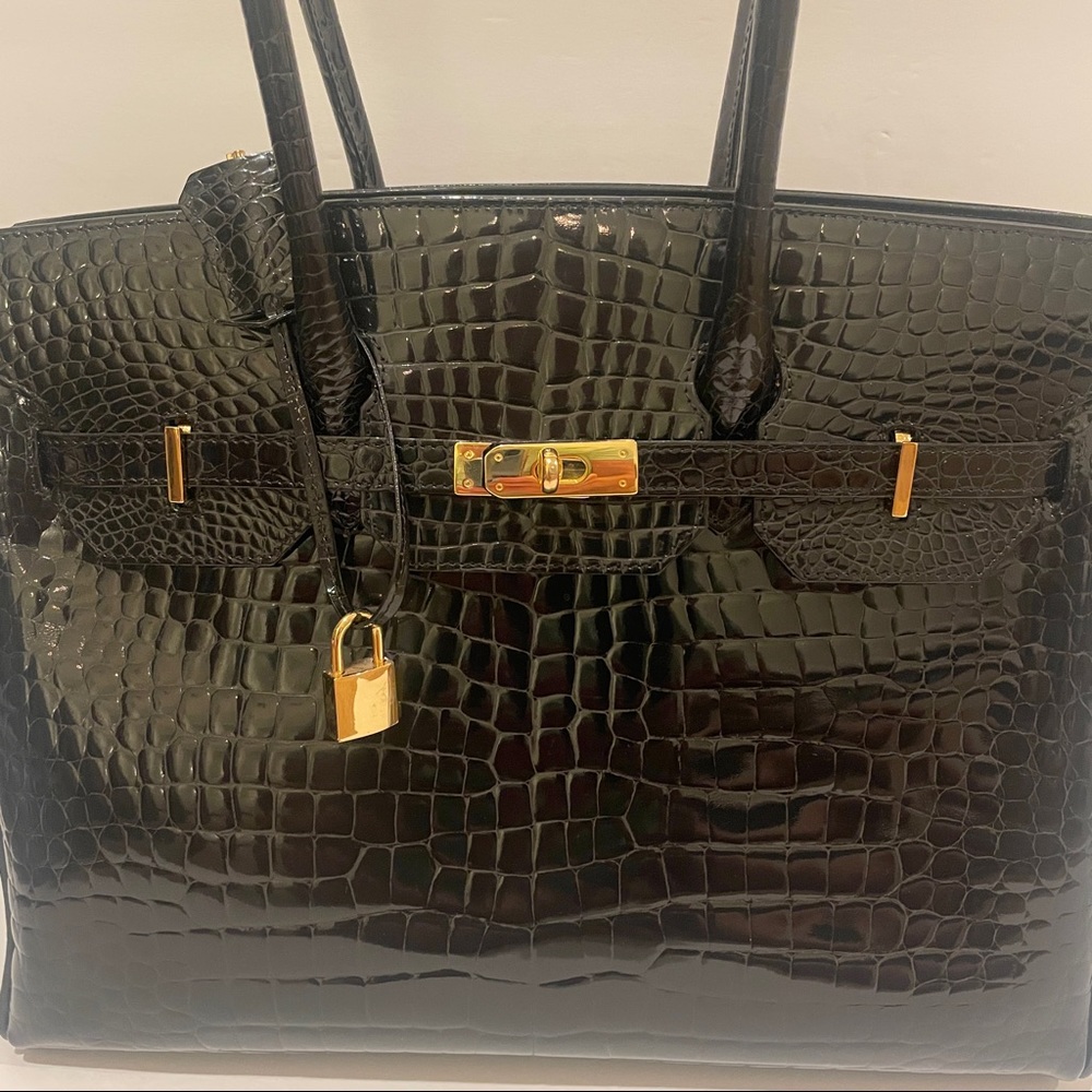 Piero Acutis  Black “Berkin” Crocodile leather satchel with gold hardware